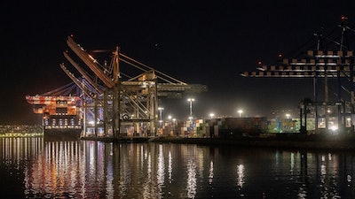 A ship is docked at the Port of Los Angeles on Nov. 21, 2022. A confidential document obtained by The Associated Press shows the International Chamber of Shipping advised its national branches in March that member companies should 'give careful consideration to the possible implications' before committing to a new plan to reduce maritime emissions.